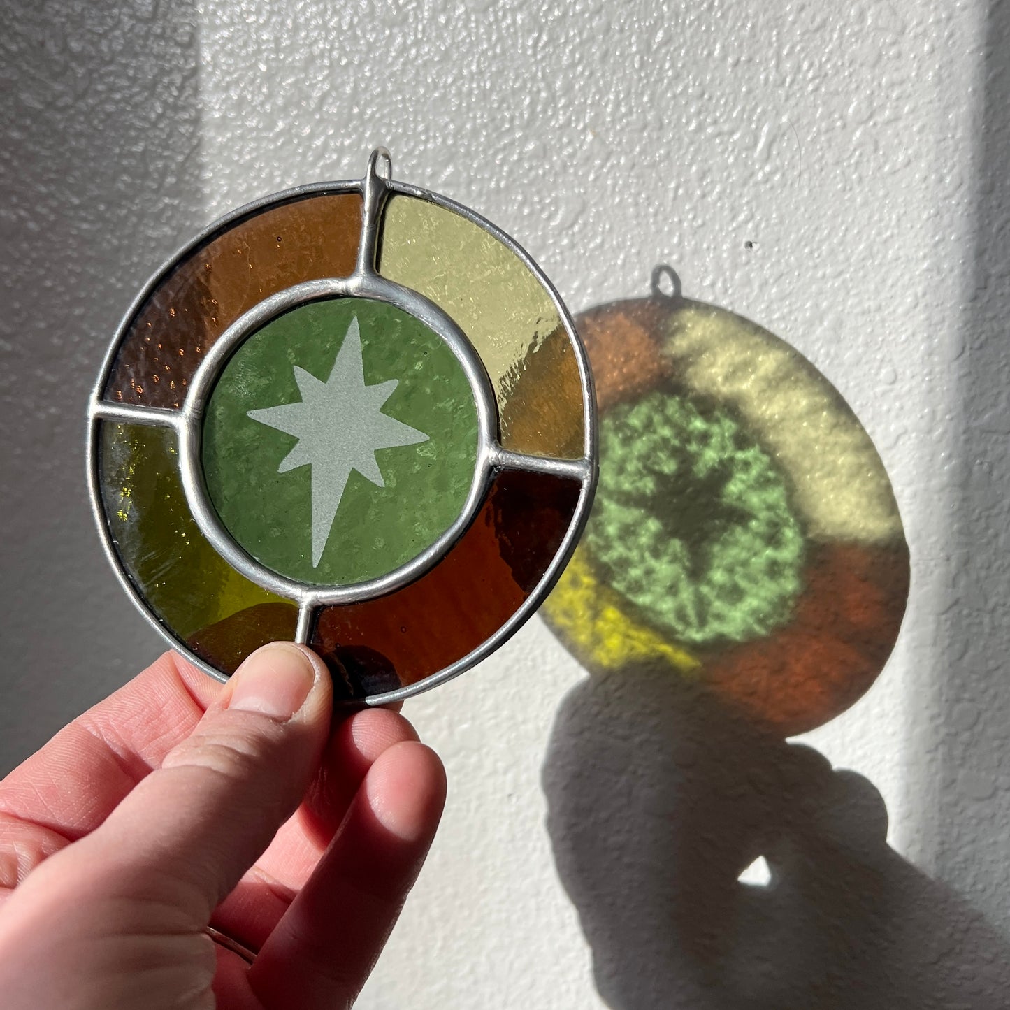 RESERVED / north star suncatcher / set of nine