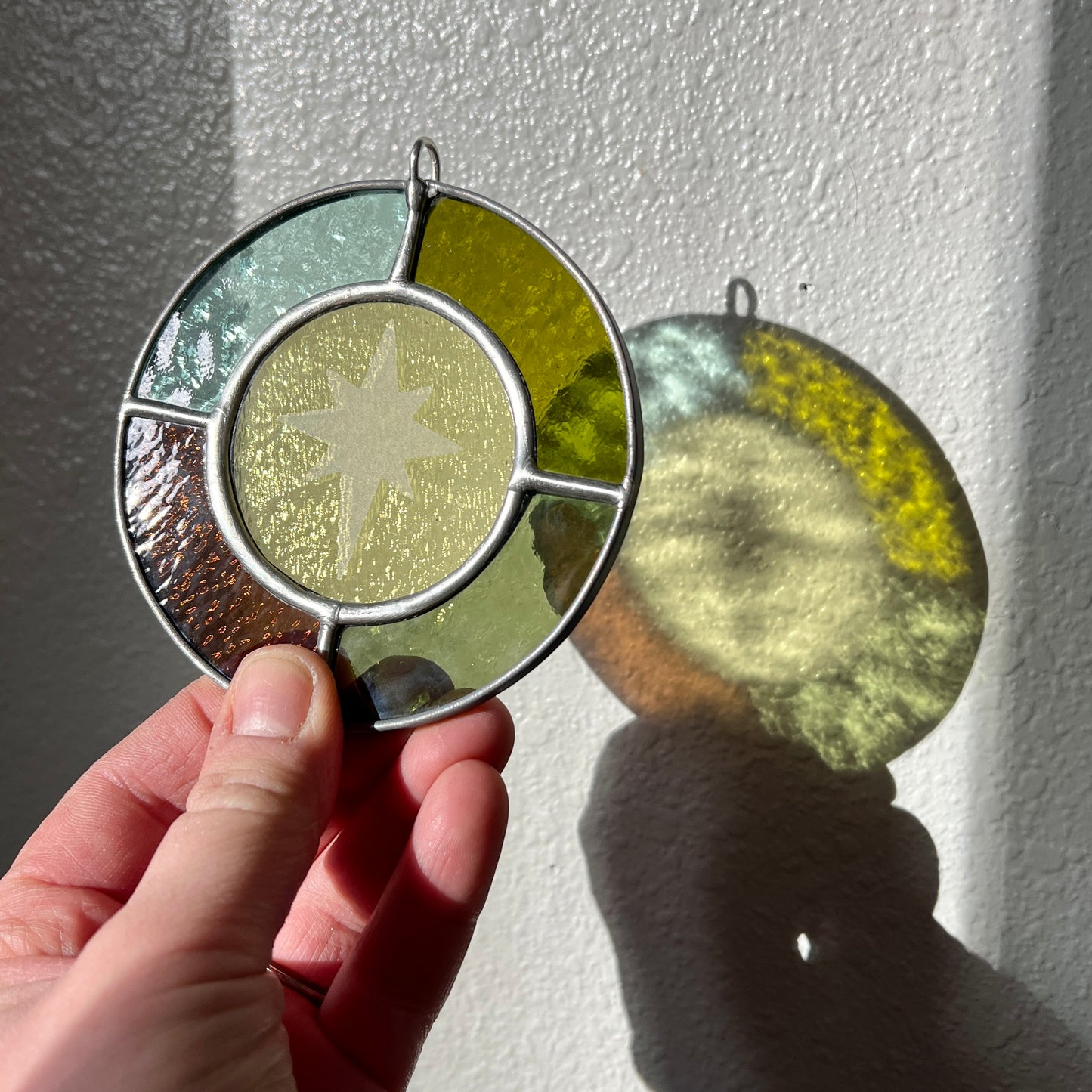 RESERVED / north star suncatcher / set of nine