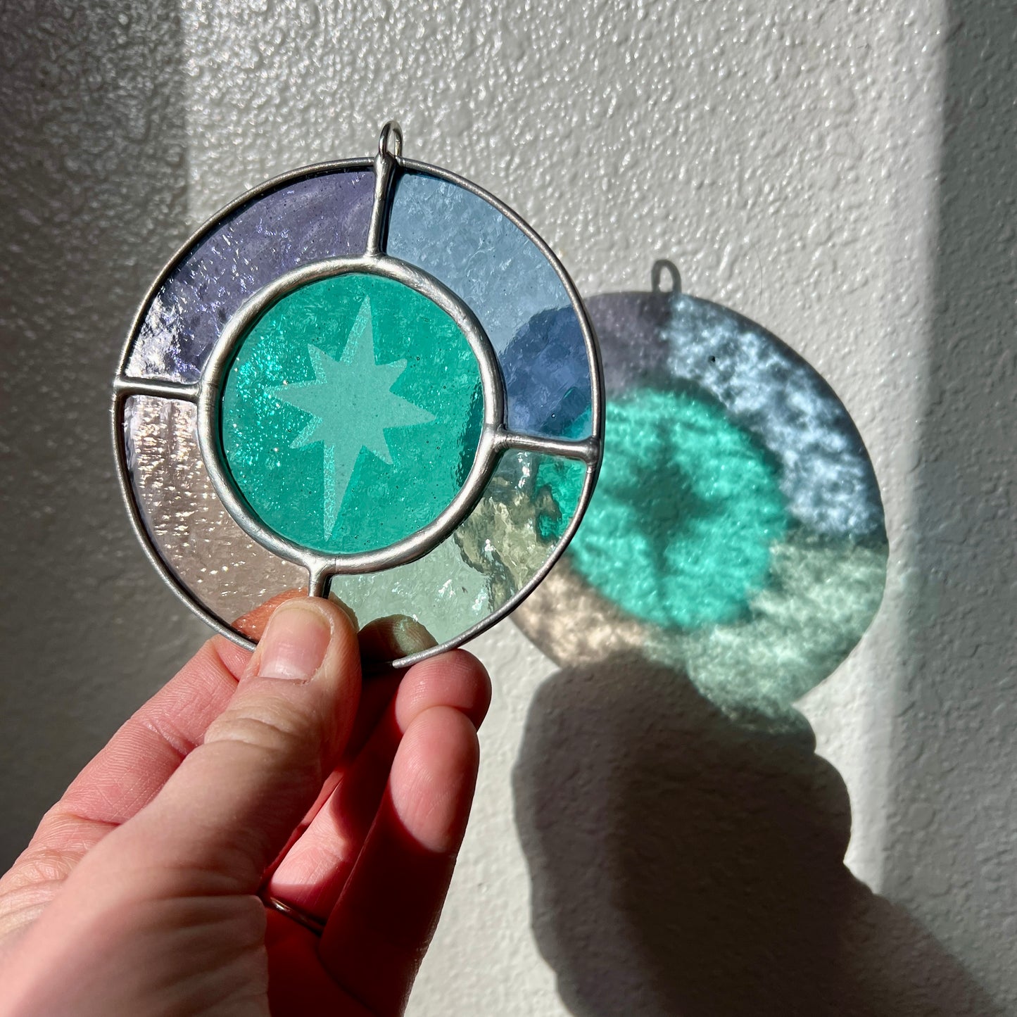RESERVED / north star suncatcher / set of nine