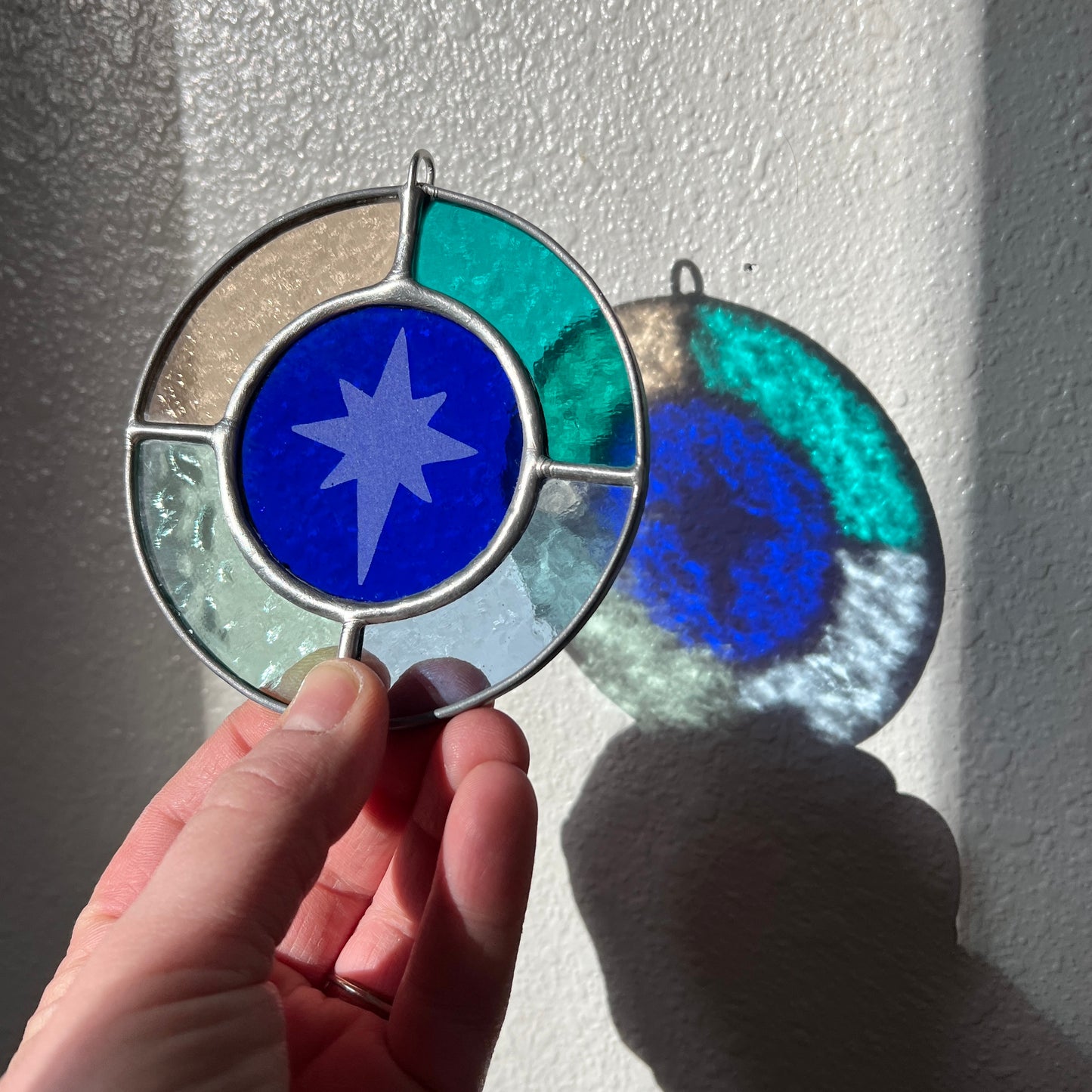 RESERVED / north star suncatcher / set of nine