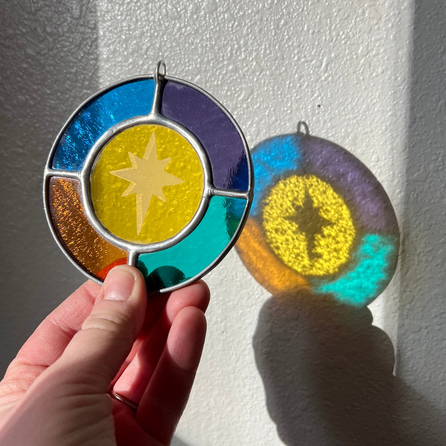 RESERVED / north star suncatcher / set of nine