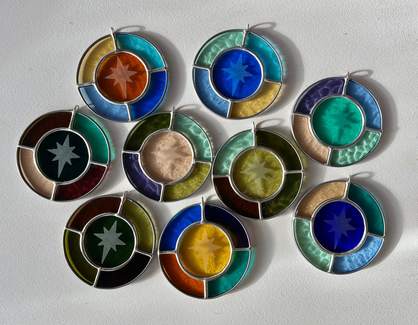 RESERVED / north star suncatcher / set of nine