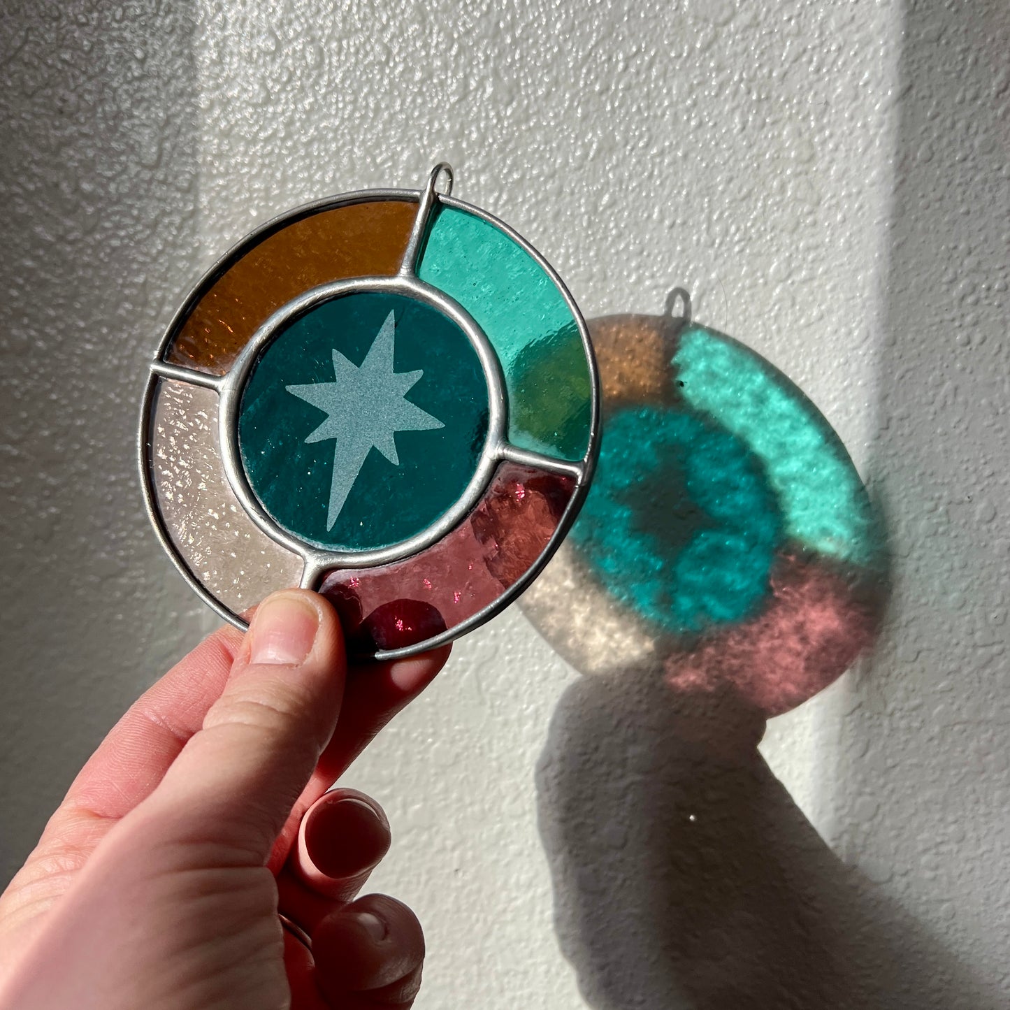 RESERVED / north star suncatcher / set of nine